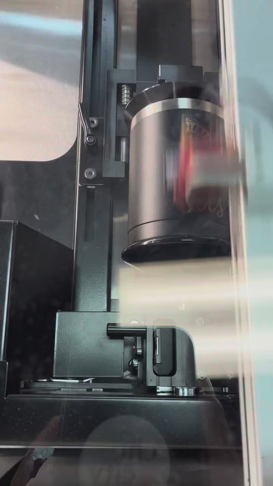 Laser engraving a black tumbler